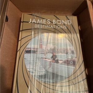 Assouline James Bond Destinations Coffee Table Book - Gold and Black